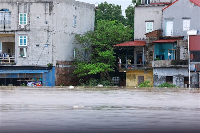 Houses in Van Ha commune are submerged by floodwaters as the river continues to overflow (Photo: VNA) bac giang flood.jpg