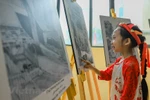 Hanoi photo expo celebrates Int’l Day of Solidarity with the Palestinian People
