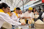 The Vietnamese booth attracts many visitors. (Photo: VNA)