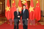 Party leader pays official visit to China