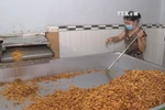 Candied coconut ribbons – a favoured delicacy during Tet