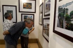 Photo exhibition highlights Hanoi’s past, present architecture
