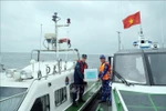 At the joint patrol between the coast guard forces of Vietnam and China (Photo: VNA)