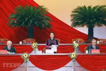 Nguyen Thi Kim Ngan (standing), Politburo member and Chairwoman of the National Assembly, introduces the lists of members of the Presidium, the Secretary Group and the board for delegate status verification for approval (Photo: VNA)