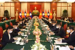 Top leaders of Vietnam, Laos vow to beef up special ties