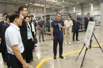 The delegation of Armenian National Assembly visits Hyundai Thanh Cong Automobile Manufacturing and Assembly Plant. (Photo: VNA)