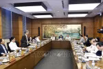 At a group discussion (Photo: VNA)