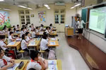 An English lesson at a primary school in Hanoi (Photo: VNA)