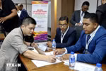 Vietnamese, Bangladeshi entrepreneurs discuss cooperation at the conference (Photo: VNA)