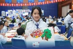 Students of the Nguyen Sieu School in Hanoi take part in the Denmark In Your Eyes painting contest. (Source: Nguyen Sieu School)