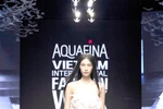 Huynh Tu Anh, winner of The Face Vietnam 2023, in a dress by designer Vo Cong Khanh, who will open the AVIFW 2024 with his latest collection called “Kiet Tac Cua Nuoc” (Masterpiece of Water). (Photo courtesy of Multimedia JSC)