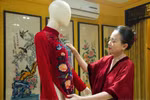 Designer incorporates Hang Trong paintings into “Ao dai” collection