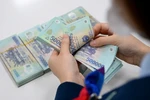 Central bank continues to reduce policy interest rates
