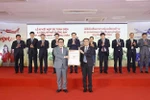 NA Chairman witnesses signing of cooperation deal between Vietnamese, Lao airlines