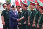 PM Pham Minh Chinh and officiers, soldiers of Army Corps 12 (Photo: VNA)