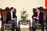 WEF Executive Director Philipp Rosler (L) meets with Prime Minister Nguyen Tan Dung on July 22 (Photo: VNA)