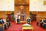 Deputy PM Nguyen Xuan Phuc received General Director of KLP Sounthone Khanthavong (Photo: VNA) 