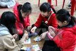 To He, a traditional craft of toy figurine making, attracts children. Source: VNA