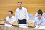 Deputy Minister of Natural Resources and Environment Le Minh Ngan speaks at the Government’s monthly meeting in Hanoi on May 4. (Photo: VNA)