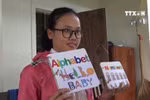 Rural woman makes colourful books from recycled paper