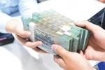 Banks propose raising small loan cap to 400 million VND