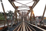 Admiring the six bridges crossing the Red River in Hanoi