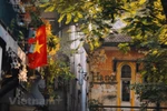 Contemplating nostalgic street corners of Hanoi 