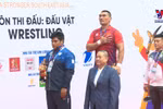 Vietnamese wrestler retires in his prime