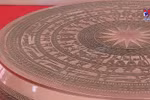 Template of Dong Son drum presented to Hanoi school