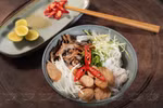 Enjoying vegetarian pho in Hanoi 