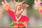 Artisan makes SEA Games mascots from jackfruit wood