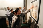 Dong Ho paintings on display in Hanoi