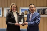 Vietnamese Ambassador to Australia Pham Hung Tam (right) and Premier of Australia's Victoria state Jacinta Allan. (Photo: VNA)