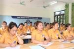 Workers learn Korean at the Employment Service Centre in the northern mountainous province of Lai Chau before going to the RoK. (Photo: VNA)