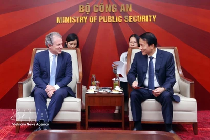 Minister of Public Security General Luong Tam Quang (right) and Daniel Rosen, CEO of Rosen Partners, at their meeting on March 17. (Photo: VNA)