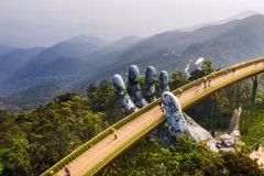 The iconic Golden Bridge at Sun World Ba Na Hills was chosen by Lonely Planet as the feature image when naming Da Nang among the top destinations for 2027. 