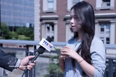 Bui Ha Anh, a student, gives an interview to VNA in New York. (Photo: VNA) 