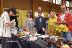 Visitors explore a space showcasing Vietnam’s traditional "to he" figurine-making art at the fourth Maintenon/Pierres Japan Festival. (Photo: VNA) 