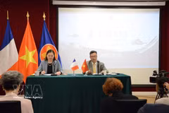 Vietnamese Ambassador to France Trinh Duc Hai (right) speaks at a press conference introducing the Vietnamese Theatre Week in France. (Photo: VNA)