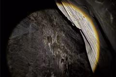 Stalactite formations inside the newly discovered cave. (Photo: Nam Quang Tri Special-use Forest Management Board) 