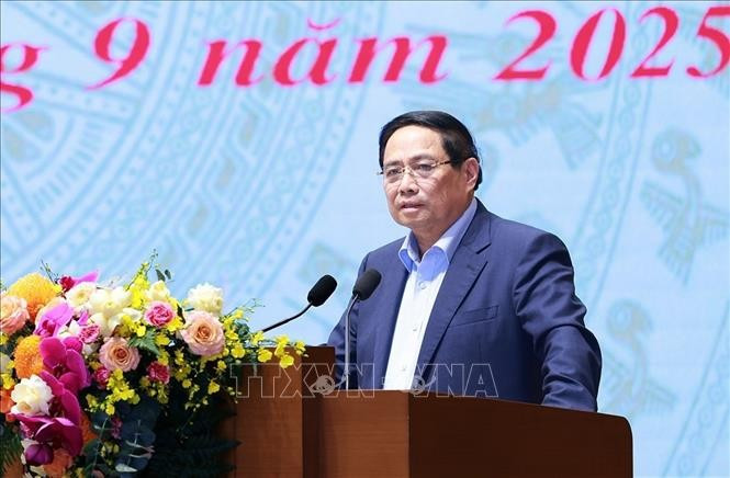 PM Pham Minh Chinh speaks at the meeting. (Photo: VNA)