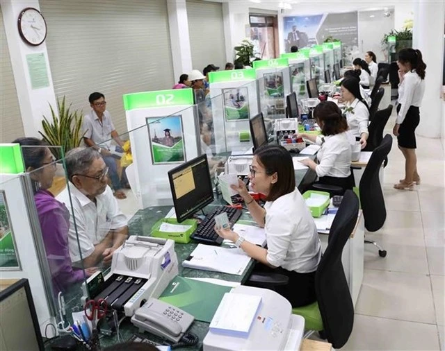 Market-wide revenue and post-tax profit rose by approximately 20.1% and 50.8% year-on-year respectively. (Photo: VNA)