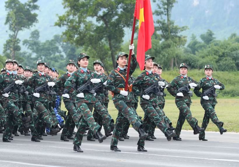 Female officers from multiple forces at the rehearsal. (Photo: VNA)