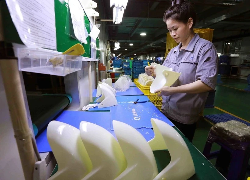 At a Taiwanese factory in An Duong industrial park, Hai Phong (Photo: VNA)