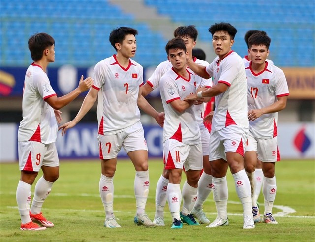 The U23 Vietnamese team celebrate beating Laos in the 2025 ASEAN U23 Championship on July 19. (Photo: vietbao.vn)