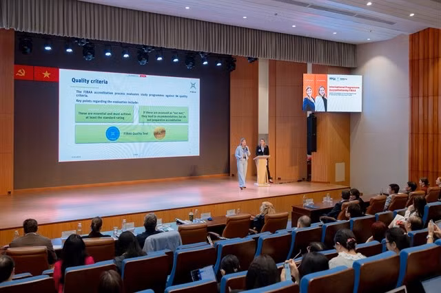 Experts from Germany’s FIBAA International Accreditation Organisation discuss international accreditation at an international conference held in HCM City on Tuesday. (Photo courtesy of UEH)