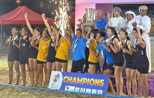Vietnam team celebrate their Asian Women's Beach Handball Championship title on May 15 in Mucat, Oman. (Photo of VHF)