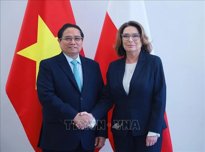 PM Pham Minh Chinh (L) and Marshal of the Polish Senate Malgorzata Kidawa-Blonska (Photo: VNA)