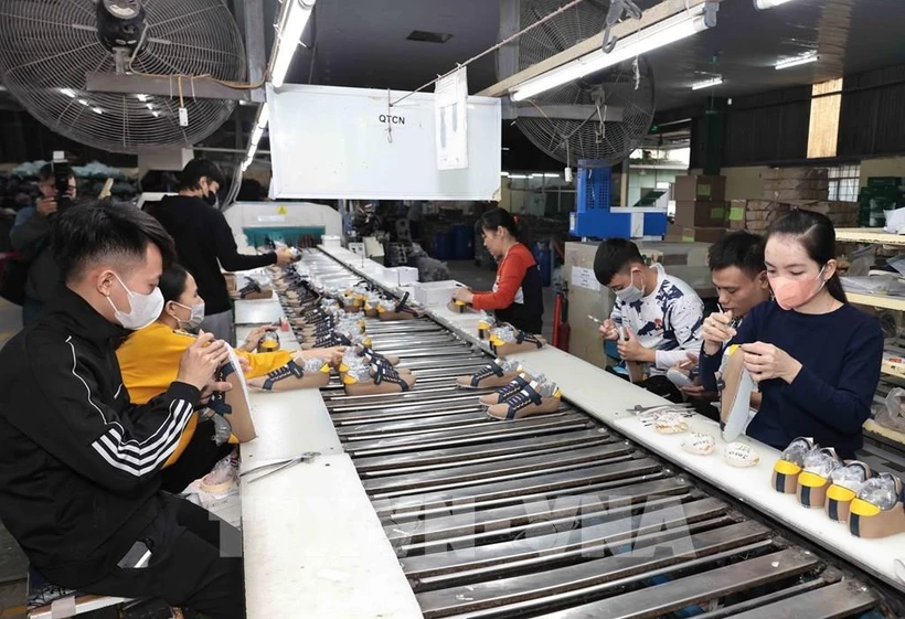 Nearly 1 million workers of more than 12,600 businesses with trade trade unions in Ho Chi Minh City have returned to work following the nine-day Lunar New Year (Tet) holiday. (Photo: VNA)