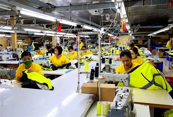 Workers at a textile company in Ho Chi Minh City (Photo: VNA)